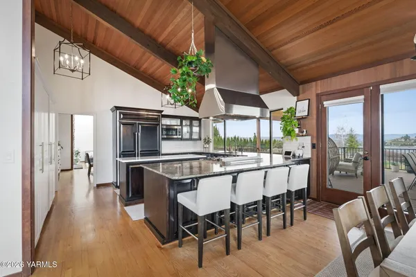 a kitchen with cabinets and white appliances