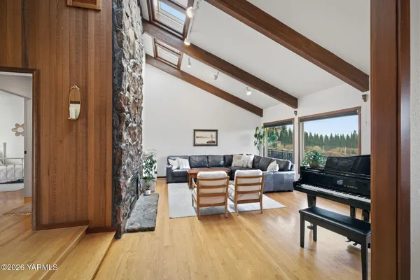 a living room with furniture and a table