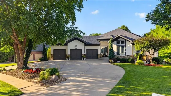$860,000 | 2313 Northeast Lake Breeze Lane, Lee's Summit, MO 64086