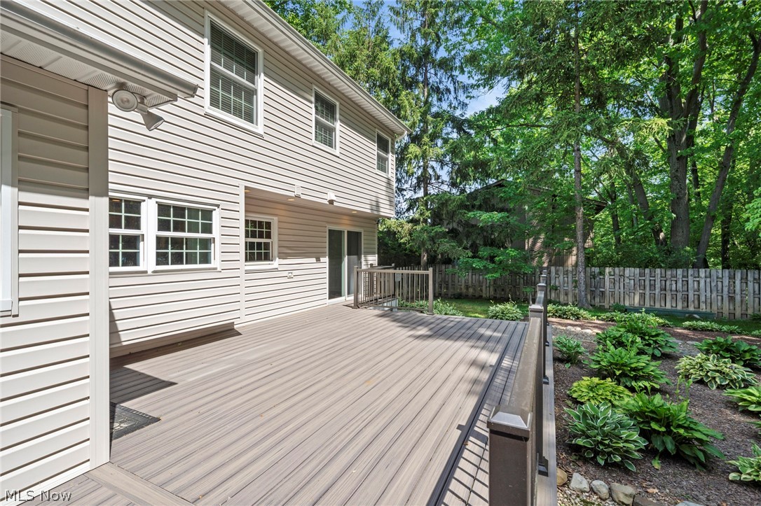 3871 Greentree Road Stow, OH 44224 - Photo 47 of 50 Expansive composite deck featuring a privacy railing, direct access to the interior, and surrounding established landscaping