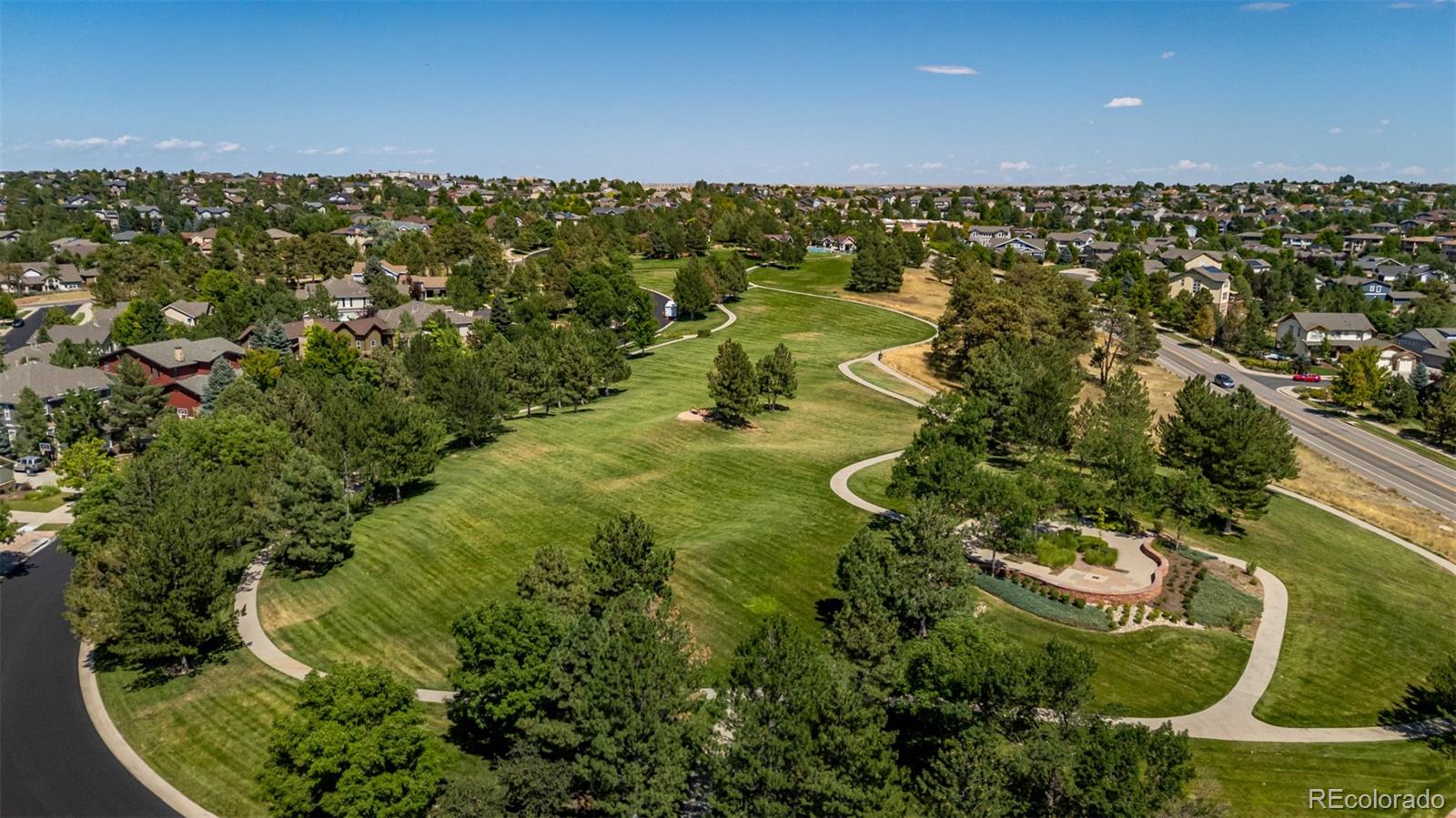24248 East Roxbury Circle Aurora, CO 80016 - Photo 34 of 42 a view of a lake with a city