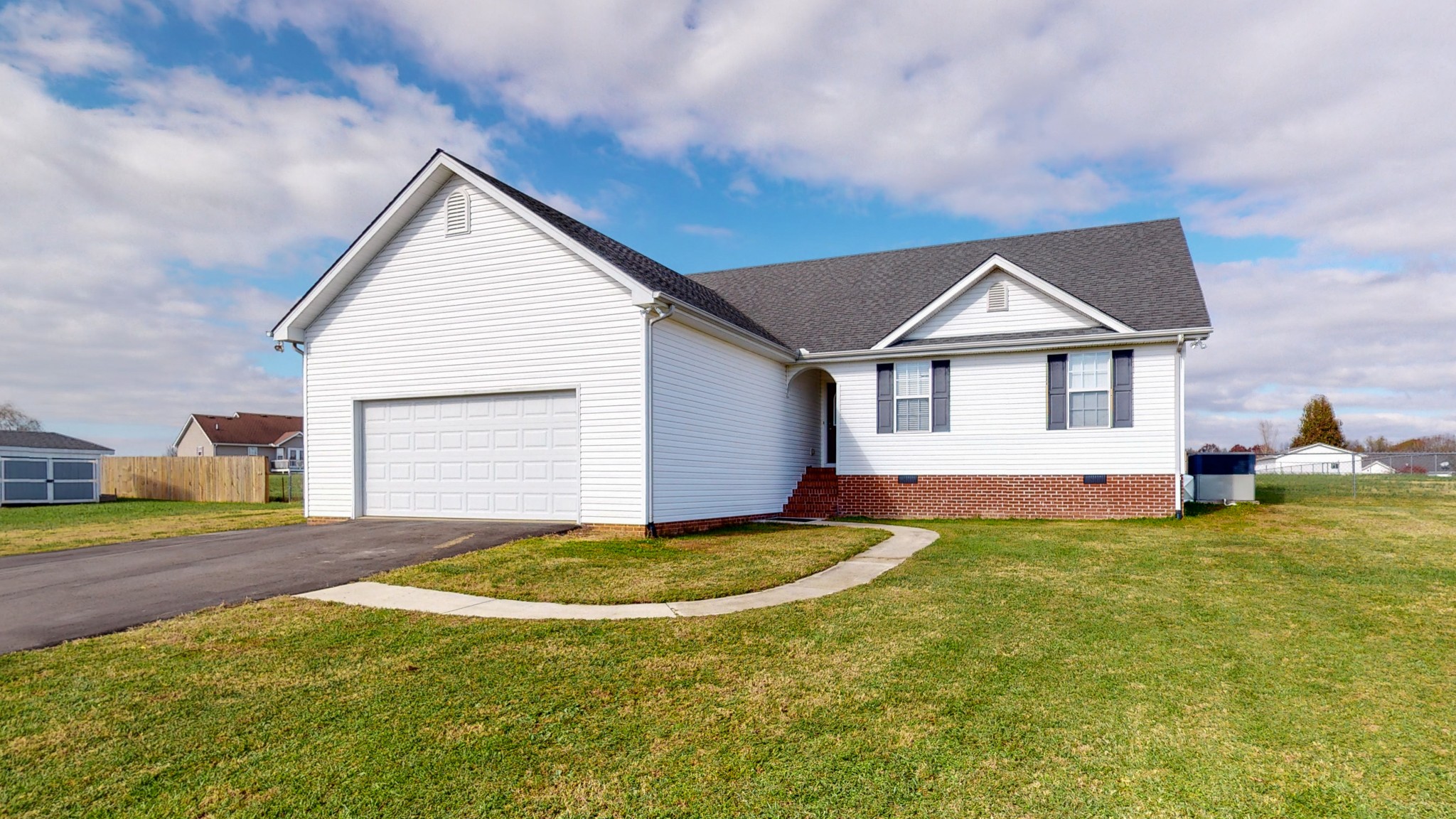 3608 Gnat Hill Road Manchester, TN 37355 - Photo 1 of 23 a view of a house with a yard and garage