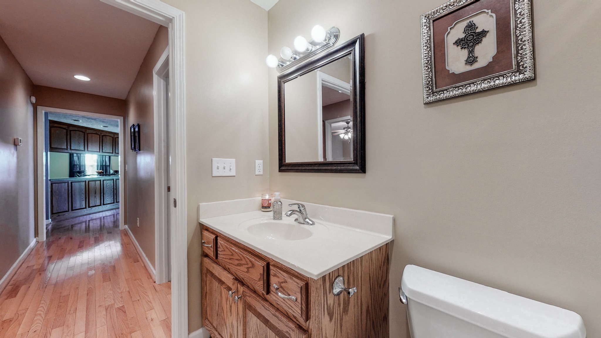 3608 Gnat Hill Road Manchester, TN 37355 - Photo 12 of 23 a bathroom with a toilet sink and mirror