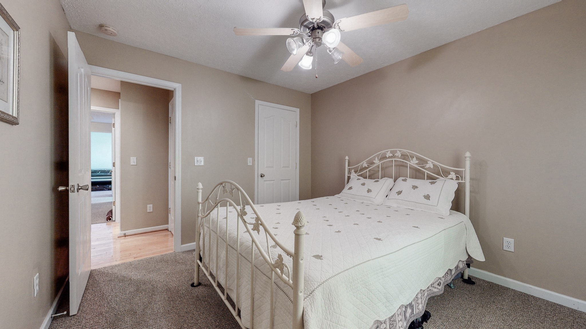 3608 Gnat Hill Road Manchester, TN 37355 - Photo 15 of 23 a bedroom with a bed and a chandelier