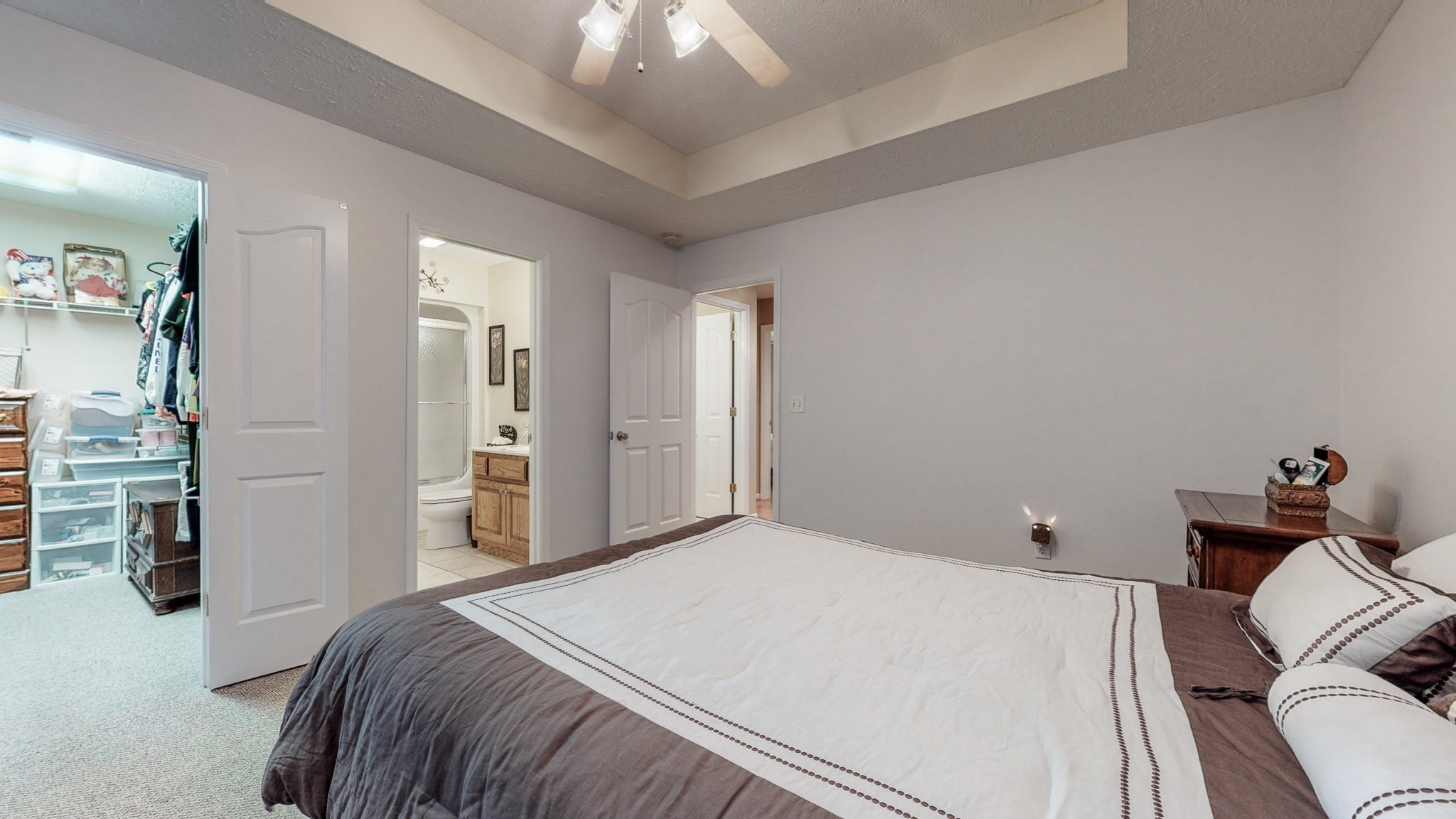 3608 Gnat Hill Road Manchester, TN 37355 - Photo 17 of 23 a bedroom with a bed and a chandelier