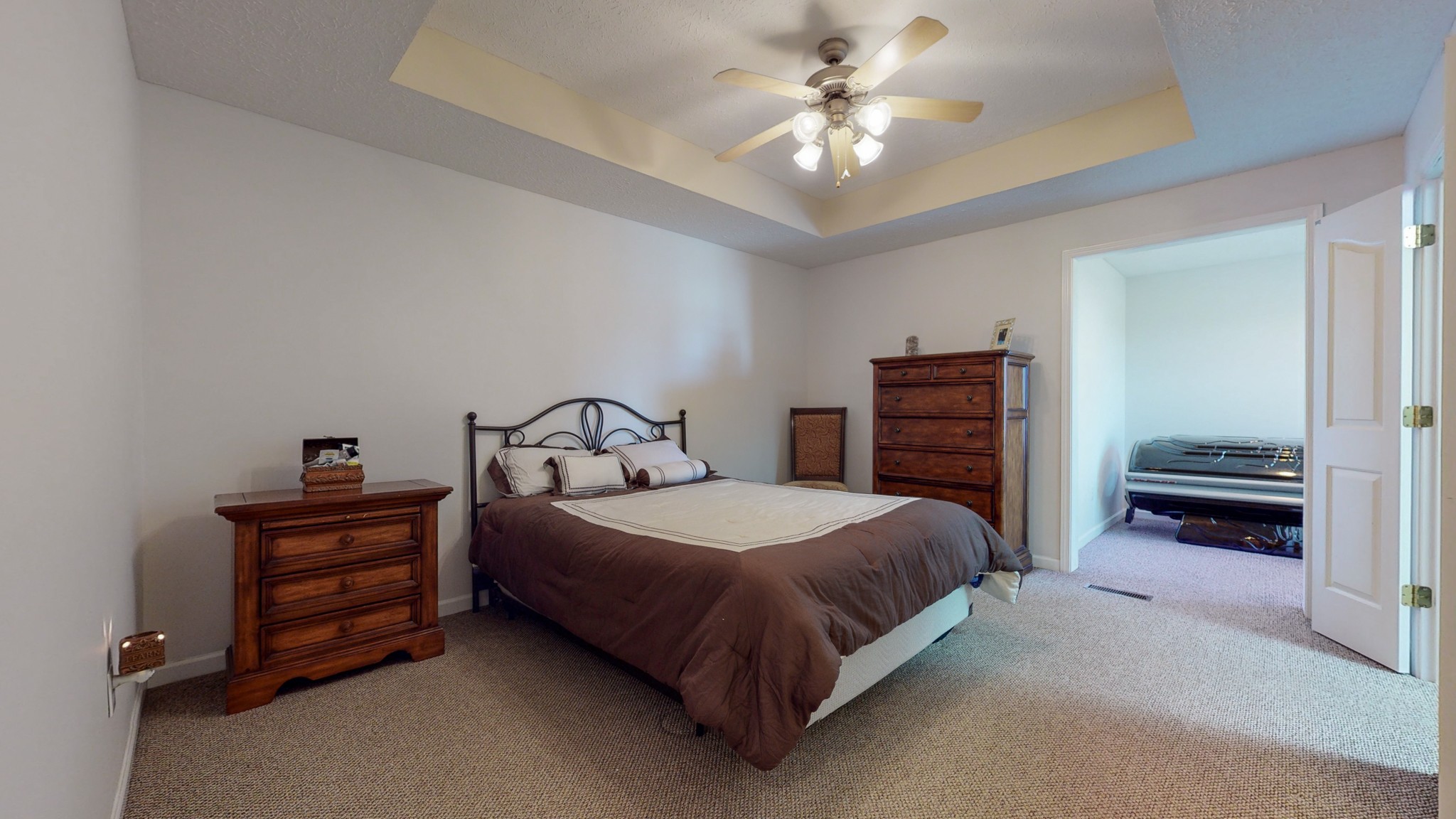 3608 Gnat Hill Road Manchester, TN 37355 - Photo 19 of 23 a bedroom with a bed and a chandelier