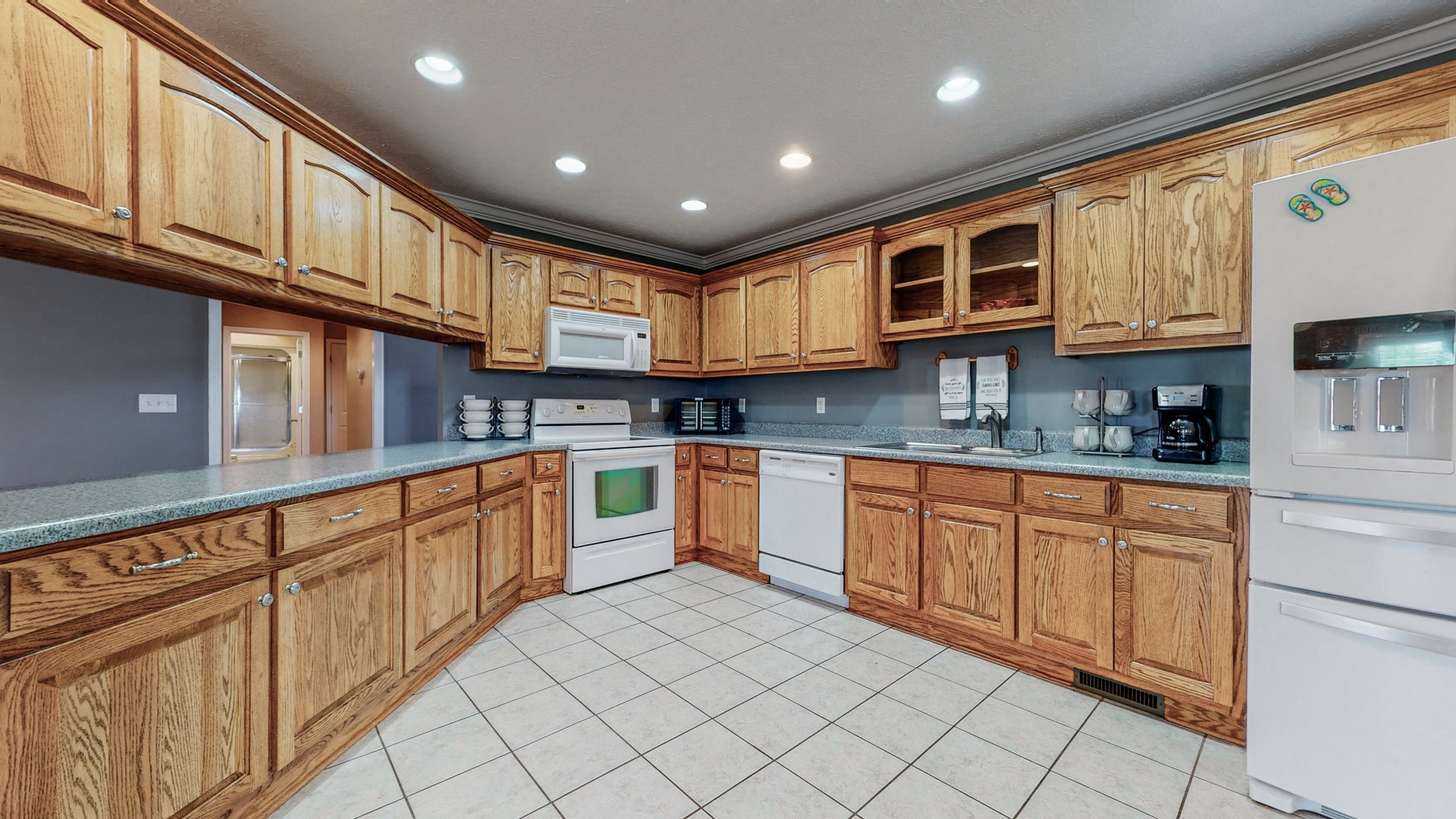 3608 Gnat Hill Road Manchester, TN 37355 - Photo 6 of 23 a kitchen with stainless steel appliances granite countertop a sink and cabinets