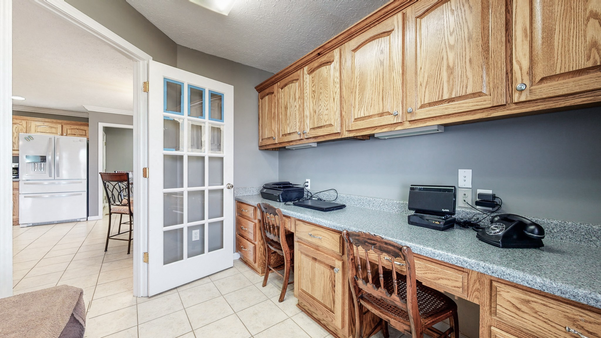 3608 Gnat Hill Road Manchester, TN 37355 - Photo 8 of 23 a kitchen with stainless steel appliances granite countertop a stove a sink and a white cabinets