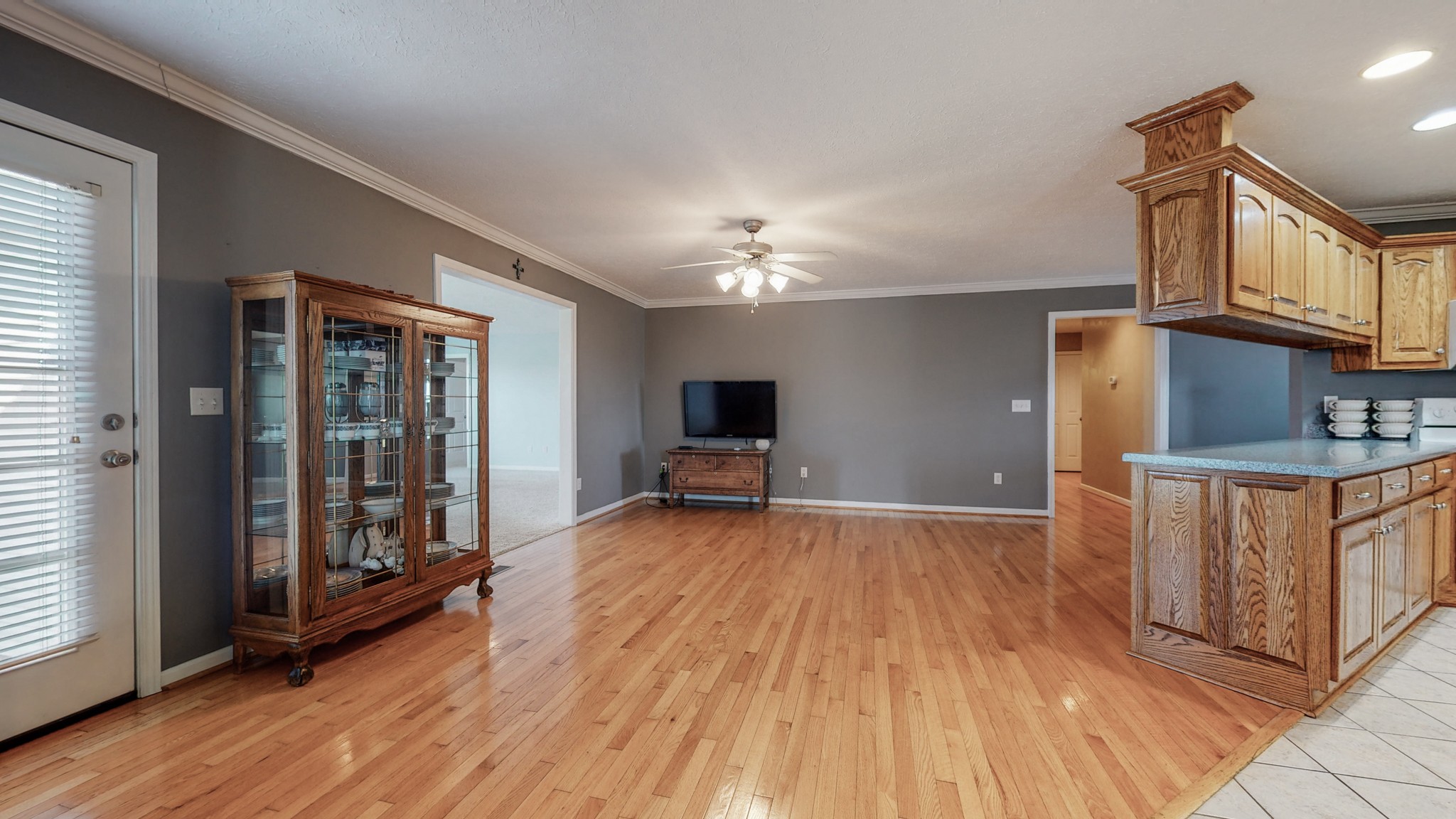 3608 Gnat Hill Road Manchester, TN 37355 - Photo 9 of 23 a view of a room with wooden floor and a fireplace