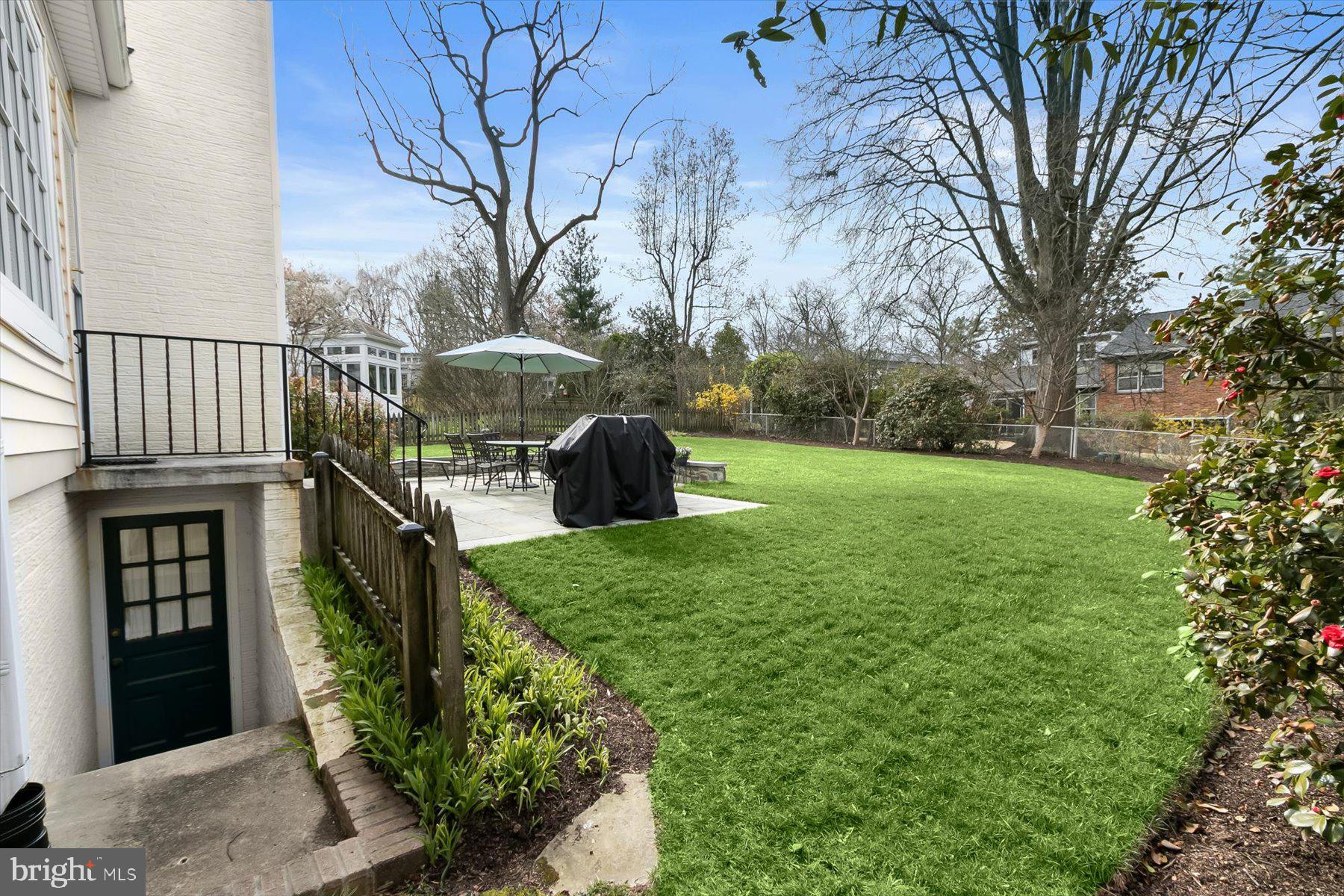 4716 Merivale Road Chevy Chase, MD 20815 - Photo 38 of 48 a view of a garden in front of a house