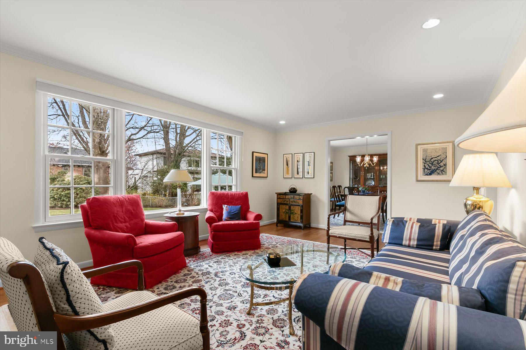 4716 Merivale Road Chevy Chase, MD 20815 - Photo 9 of 48 a living room with furniture large windows and wooden floor