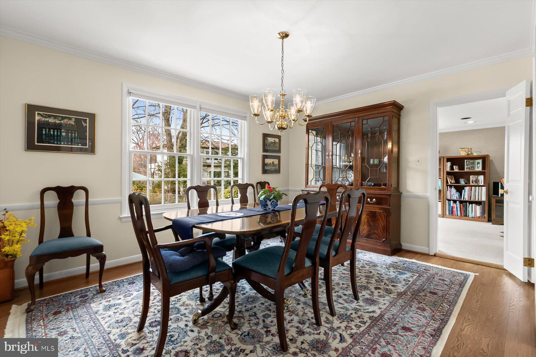 4716 Merivale Road Chevy Chase, MD 20815 - Photo 10 of 48 a view of a dining room with furniture and window