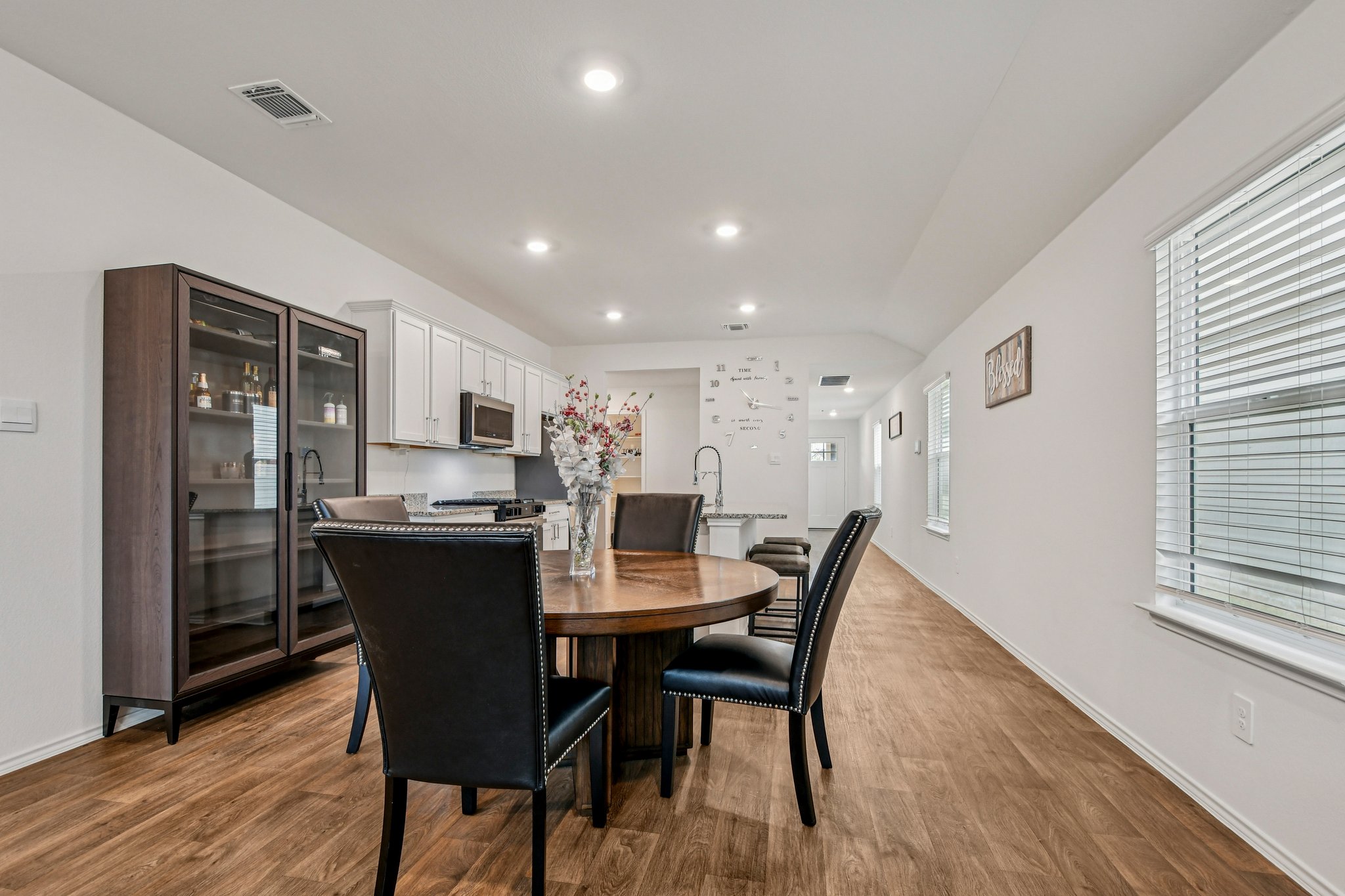 519 Sandringham Loop Kyle, TX 78640 - Photo 12 of 32 Dining space with light wood-style flooring and recessed lighting