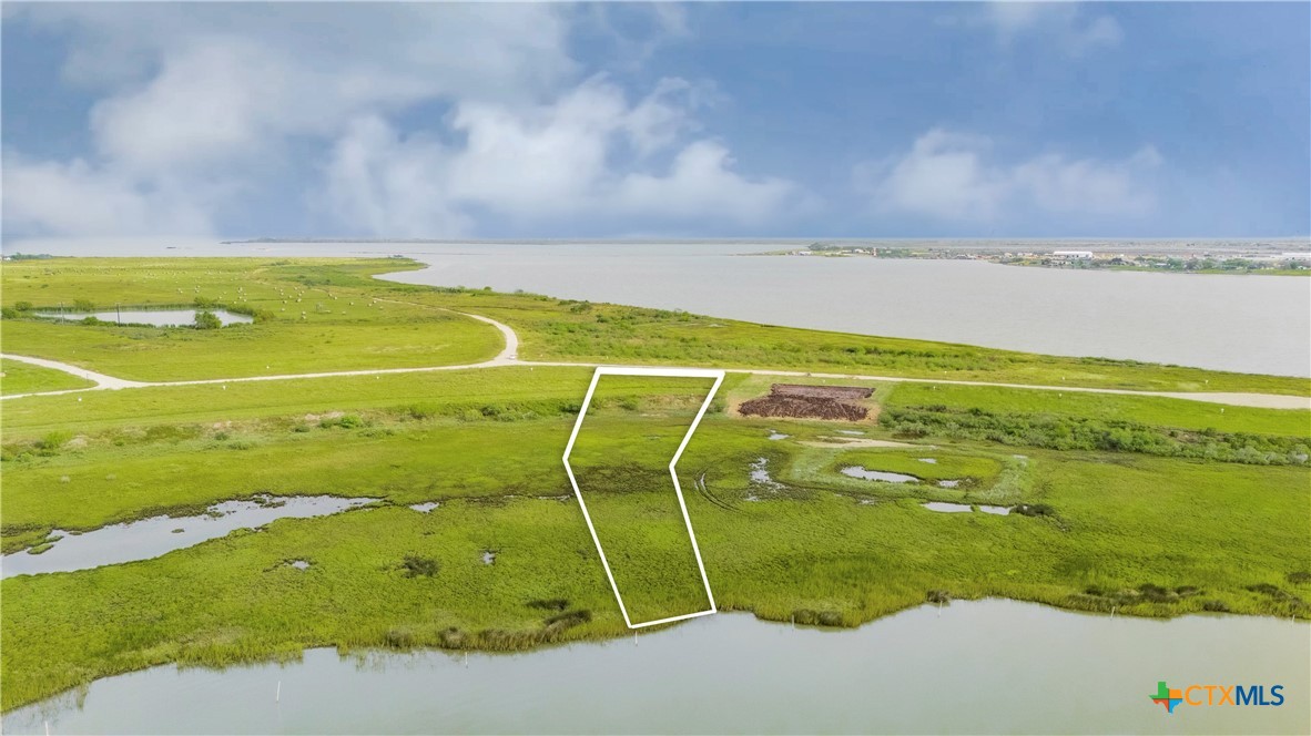 Lot 356 Evening Point Port Port Lavaca, TX 77979 - Photo 3 of 10 a view of an ocean & house
