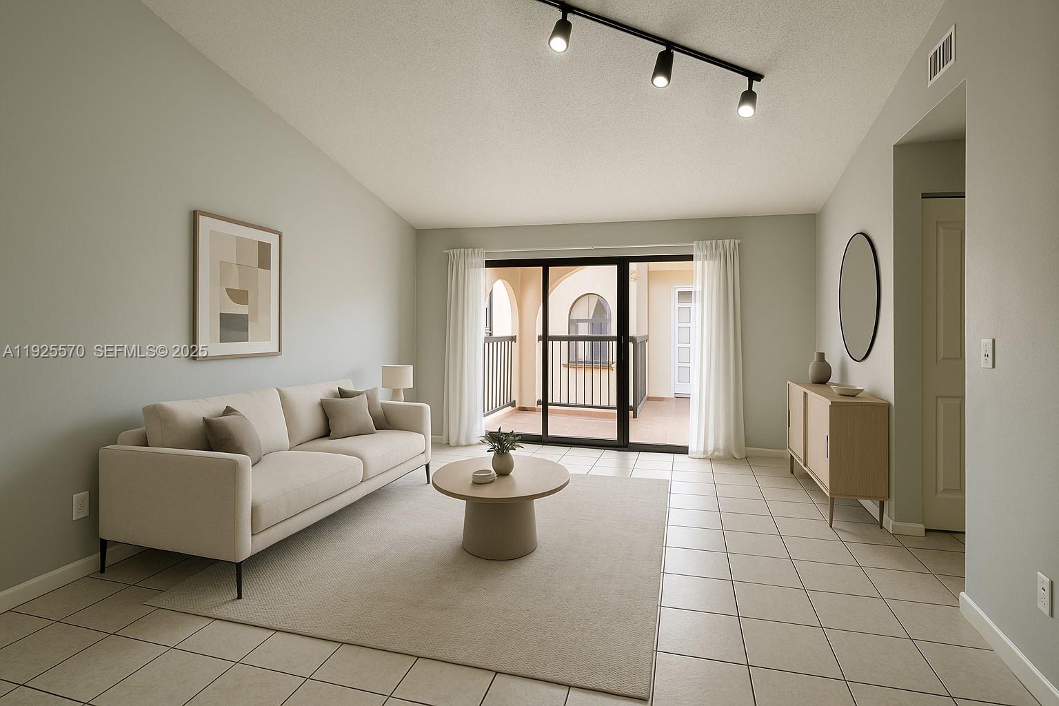 18250 Mediterranean Boulevard, Unit 1508 Hialeah, FL 33015 - Photo 2 of 26 a living room with furniture and a window