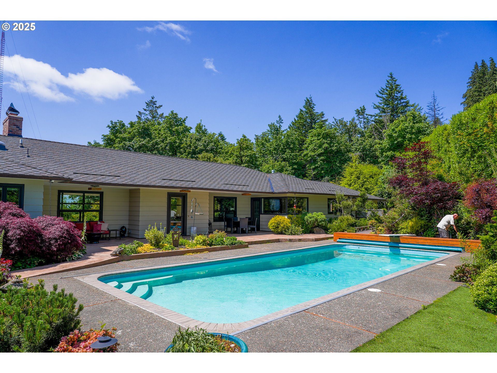 7131 Northwest Penridge Road Portland, OR 97229 - Photo 12 of 43 a view of an house with backyard space and sitting area