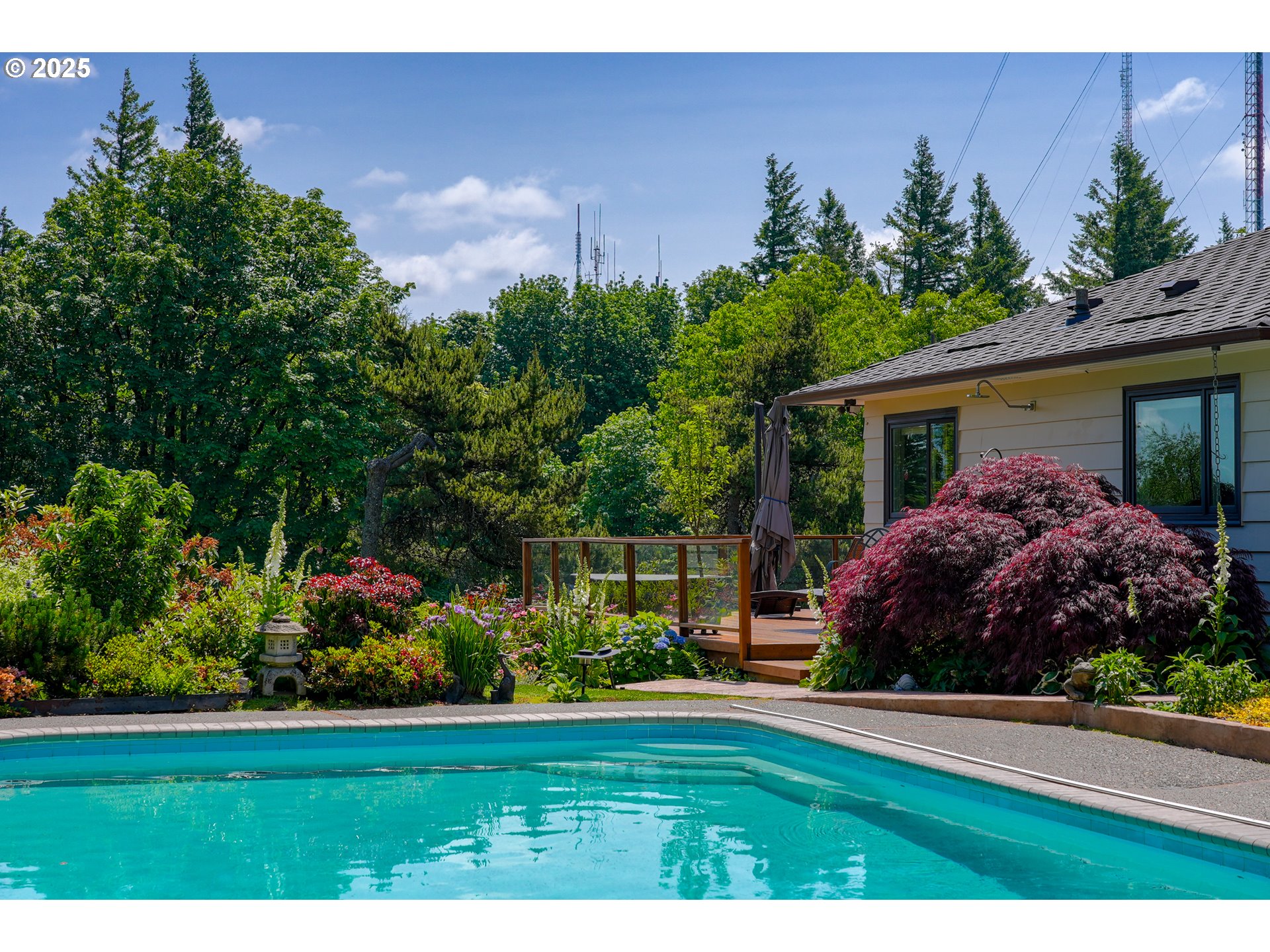 7131 Northwest Penridge Road Portland, OR 97229 - Photo 15 of 43 a view of a house with a garden