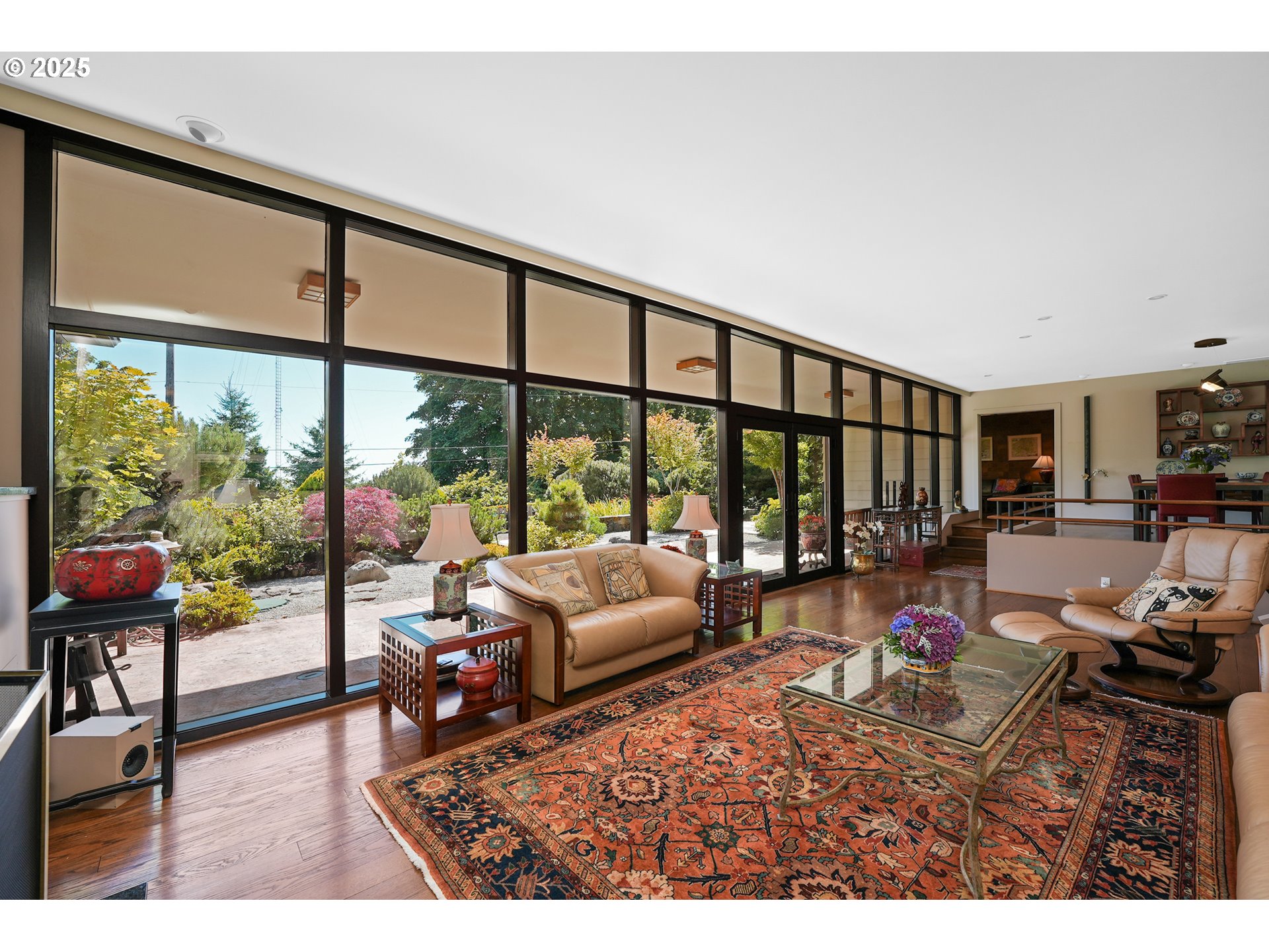 7131 Northwest Penridge Road Portland, OR 97229 - Photo 16 of 43 a living room with furniture and a large window