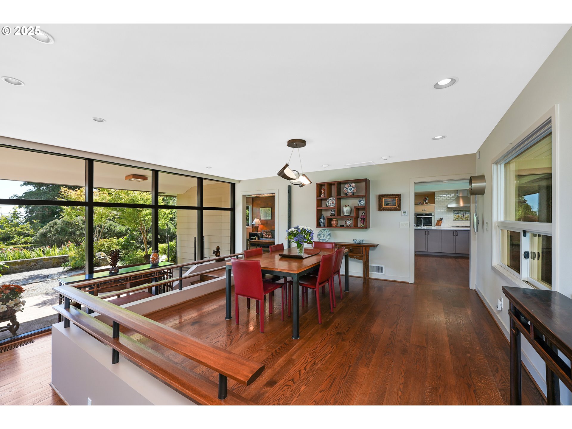 7131 Northwest Penridge Road Portland, OR 97229 - Photo 19 of 43 a view of a dining room with furniture window and wooden floor
