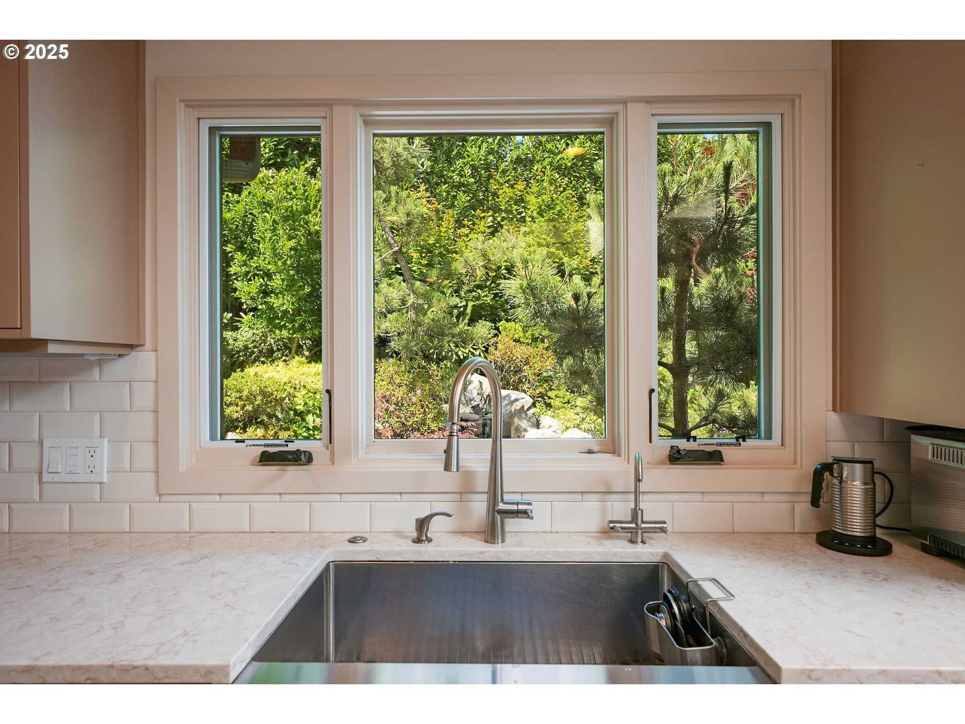 7131 Northwest Penridge Road Portland, OR 97229 - Photo 27 of 43 a kitchen with a sink and large window