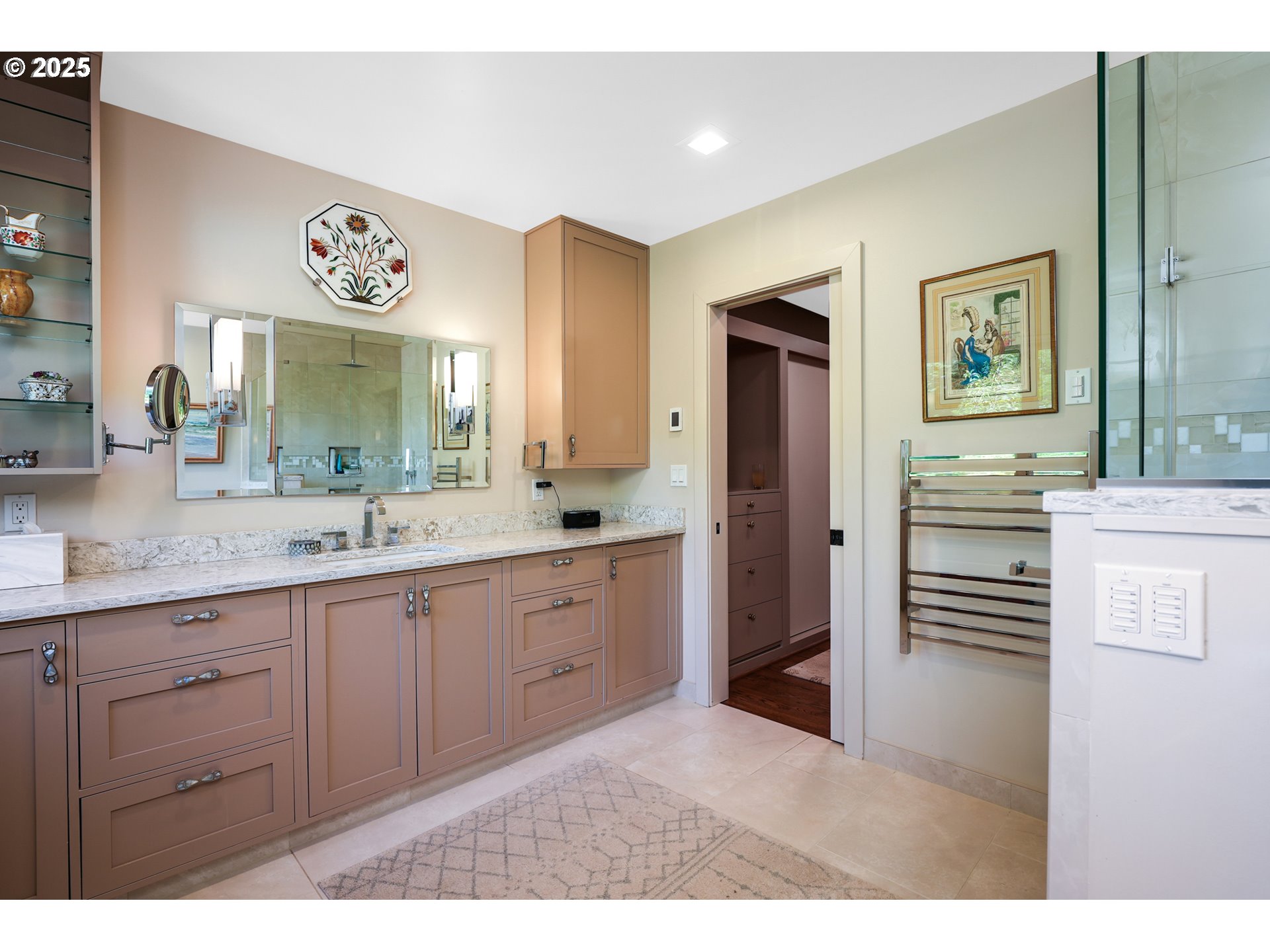 7131 Northwest Penridge Road Portland, OR 97229 - Photo 32 of 43 a bathroom with a sink a vanity and a mirror