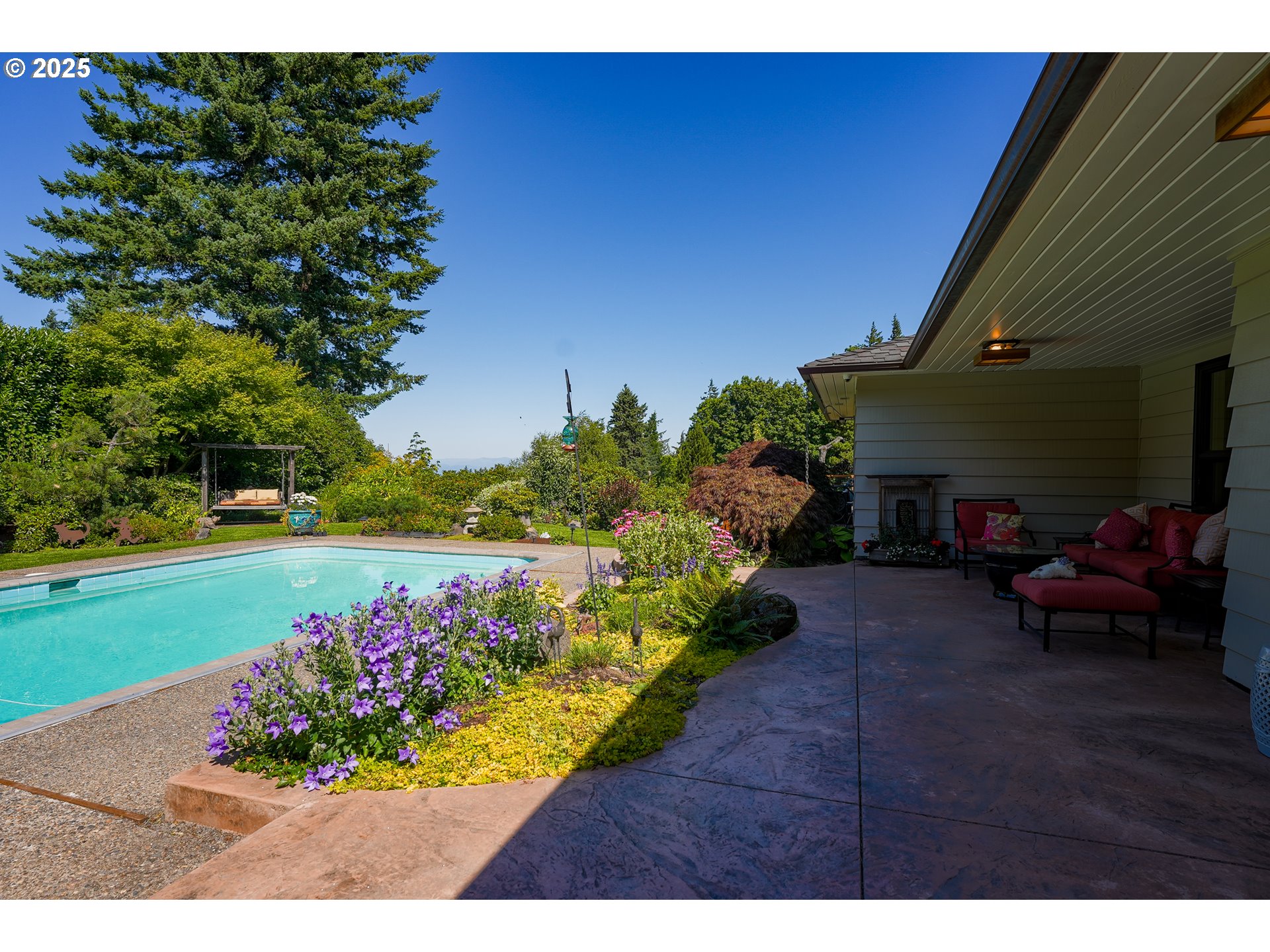 7131 Northwest Penridge Road Portland, OR 97229 - Photo 39 of 43 a view of a house with a yard