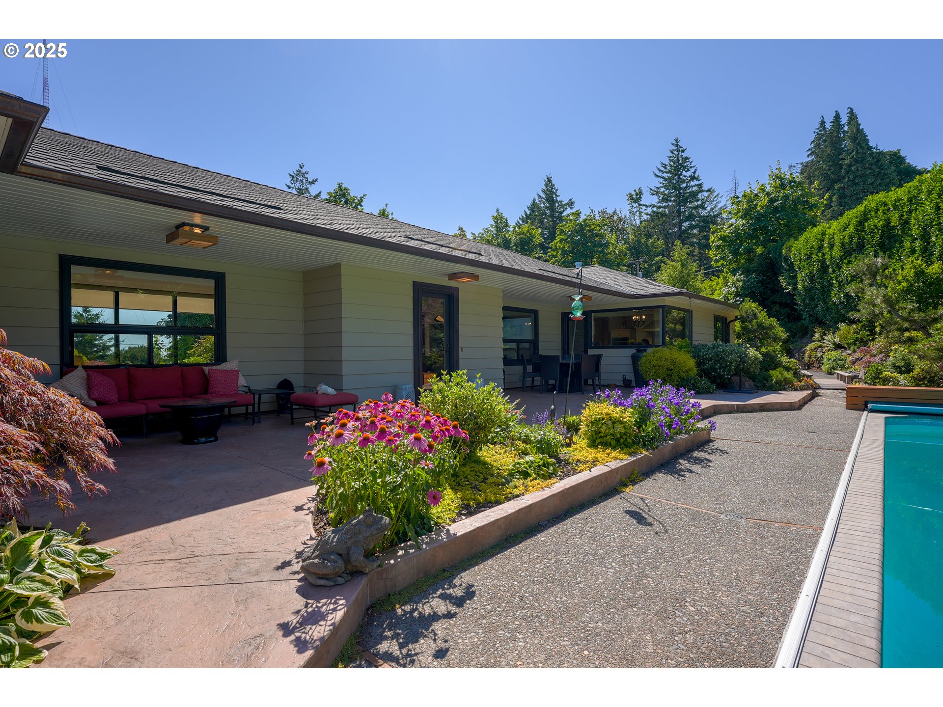 7131 Northwest Penridge Road Portland, OR 97229 - Photo 41 of 43 a house view with a garden space