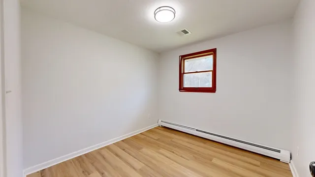 an empty room with a window