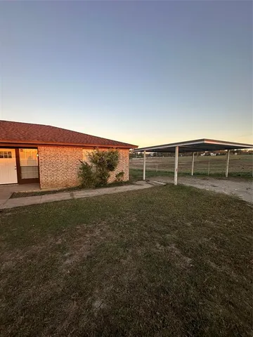 a view of outdoor space and yard