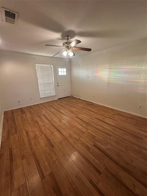 120 Don Propp Road Azle, TX 76020 - Photo 6 of 22 a view of empty room with wooden floor