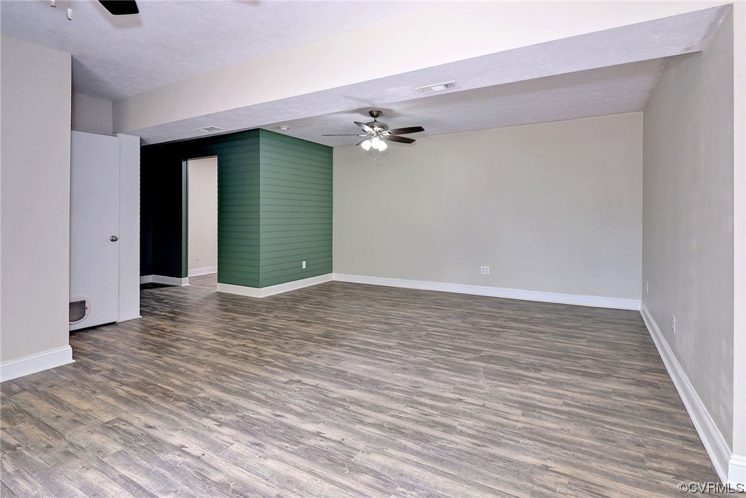 250 Reflection Drive Williamsburg, VA 23188 - Photo 27 of 42 wooden floor in an empty room