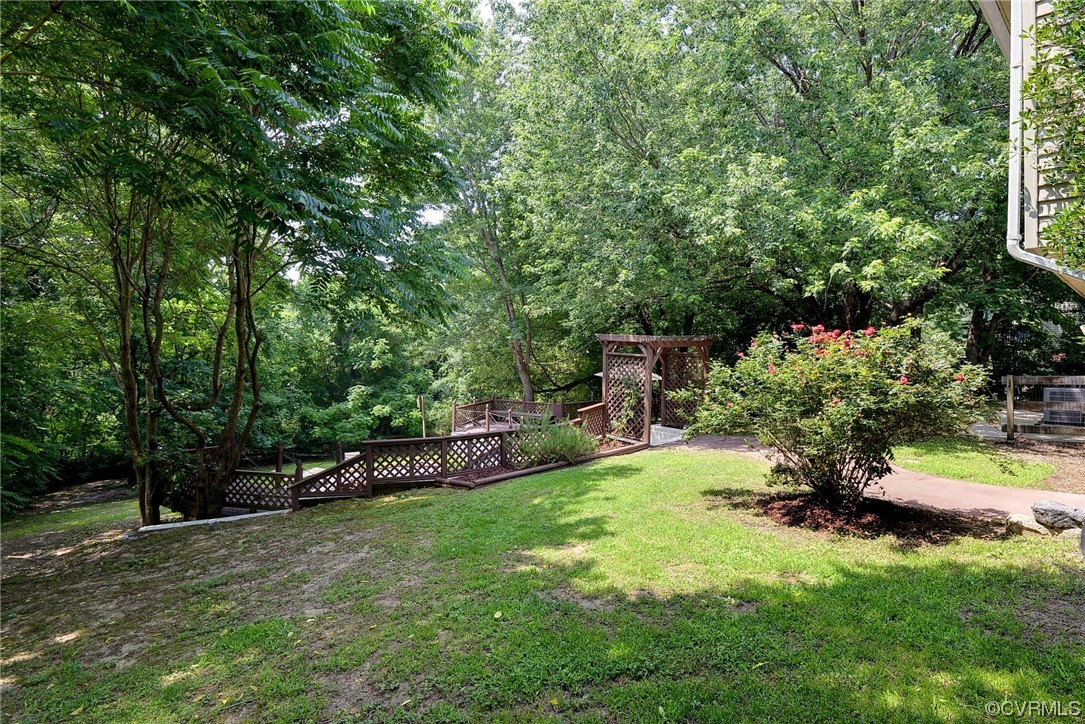 250 Reflection Drive Williamsburg, VA 23188 - Photo 30 of 42 a view of backyard with swimming pool