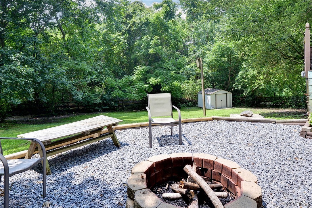250 Reflection Drive Williamsburg, VA 23188 - Photo 37 of 42 a view of a park with lounge chairs