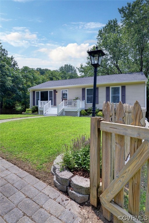 250 Reflection Drive Williamsburg, VA 23188 - Photo 4 of 42 a house view with a seating space and garden