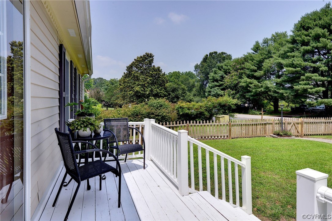 250 Reflection Drive Williamsburg, VA 23188 - Photo 8 of 42 a view of a table and chairs on the roof deck