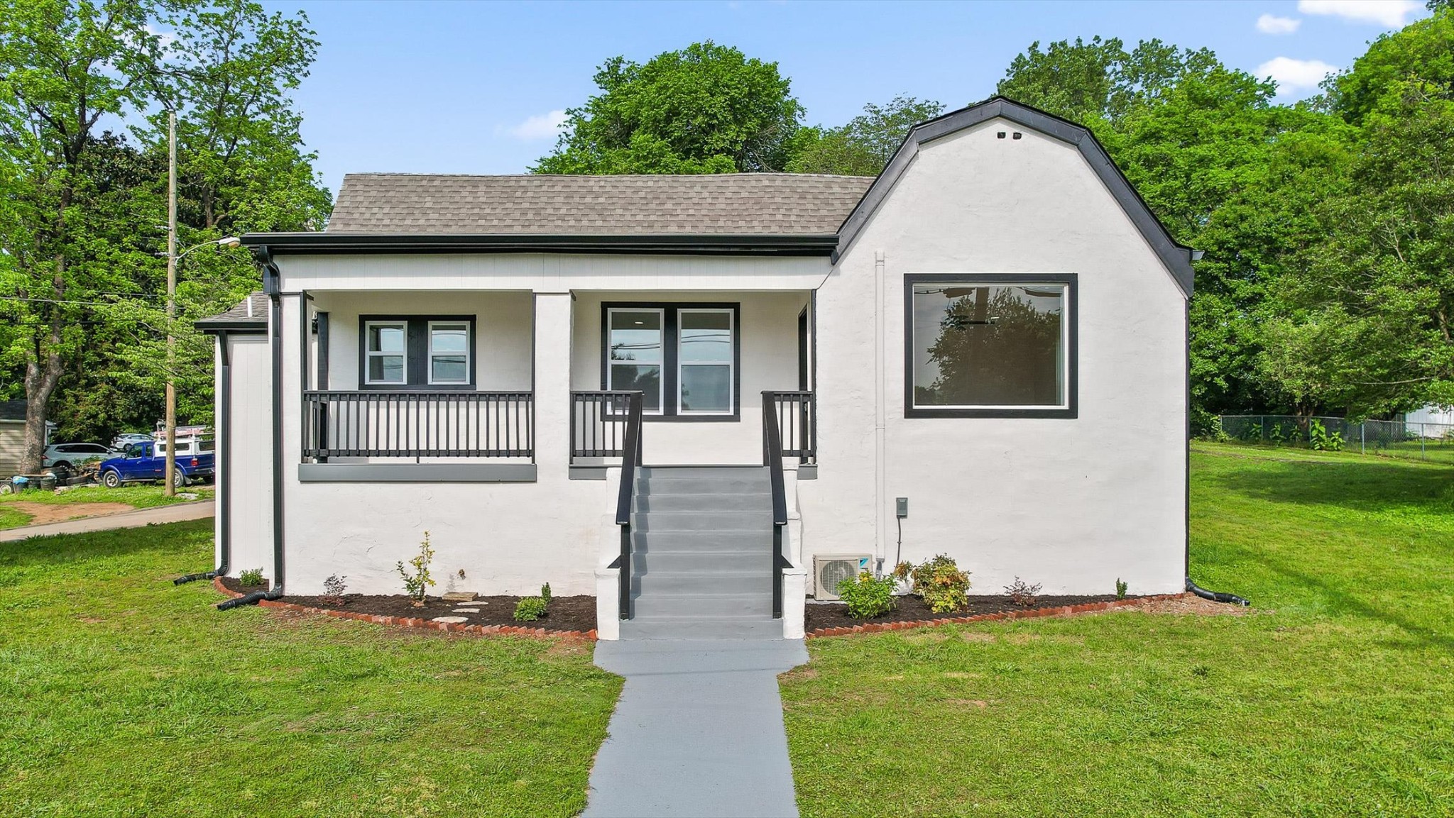 2917 East Crescent Circle Chattanooga, TN 37407 - Photo 1 of 45 a front view of a house with a yard