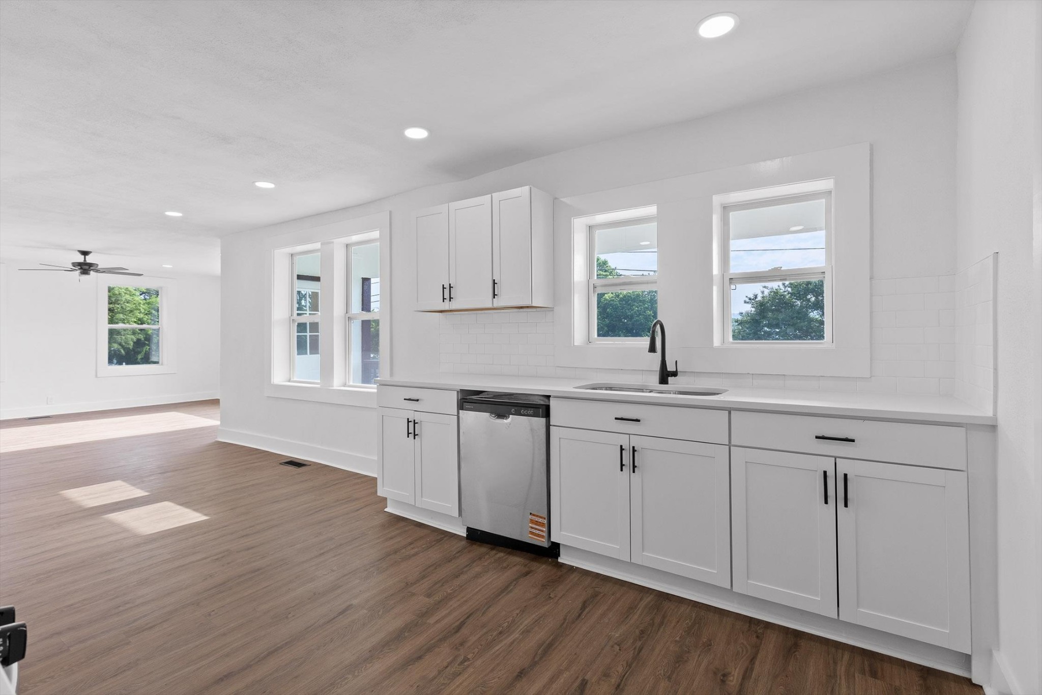 2917 East Crescent Circle Chattanooga, TN 37407 - Photo 12 of 45 a kitchen with sink cabinets and wooden floor