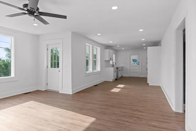 a view of an empty room with a window