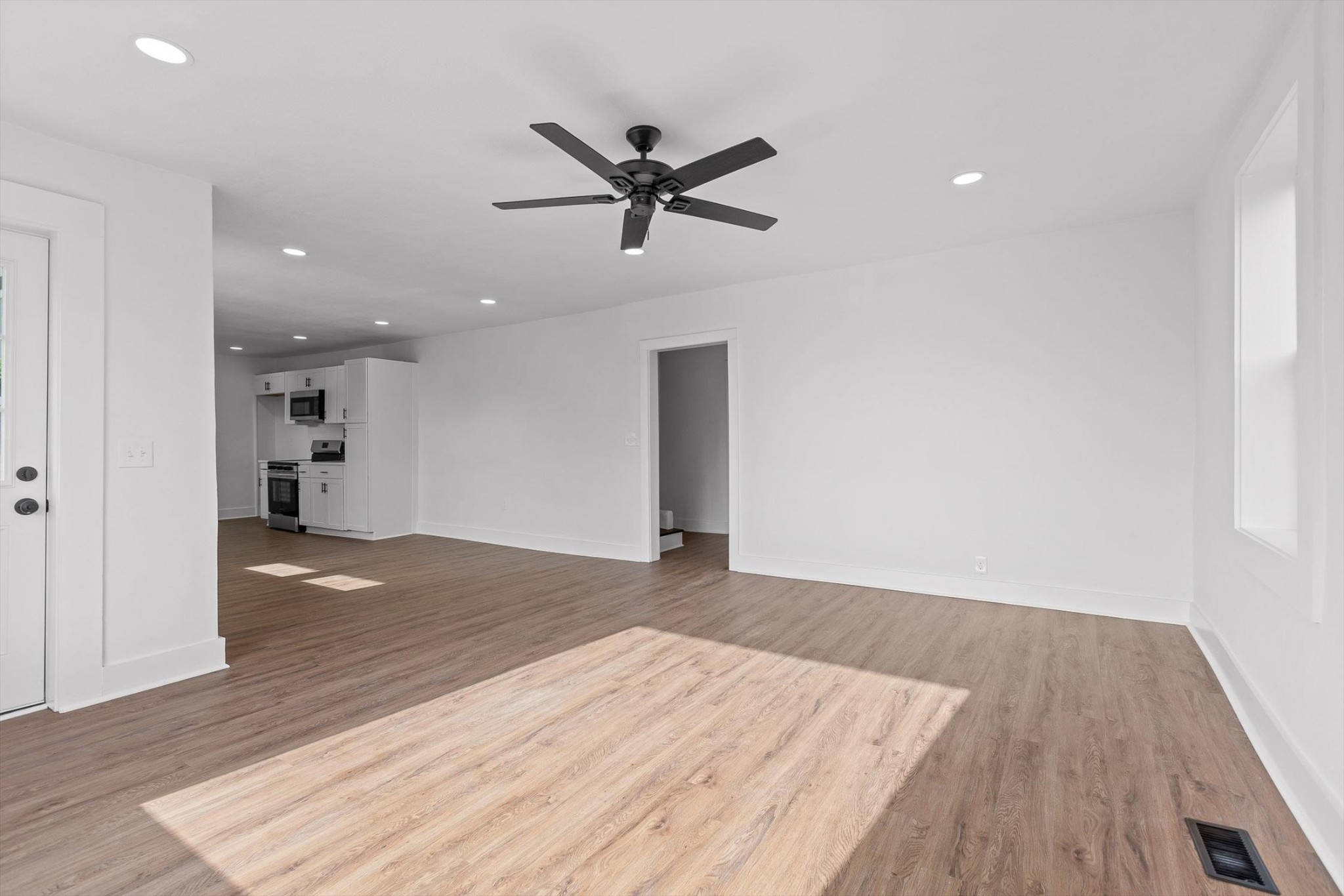 2917 East Crescent Circle Chattanooga, TN 37407 - Photo 16 of 45 a view of empty room with wooden floor and fan