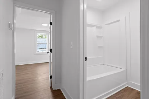 a bathroom with a bathtub