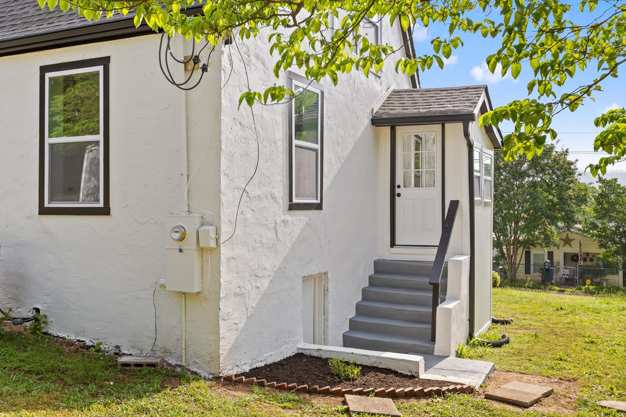 2917 East Crescent Circle Chattanooga, TN 37407 - Photo 31 of 45 a front view of a house with garden
