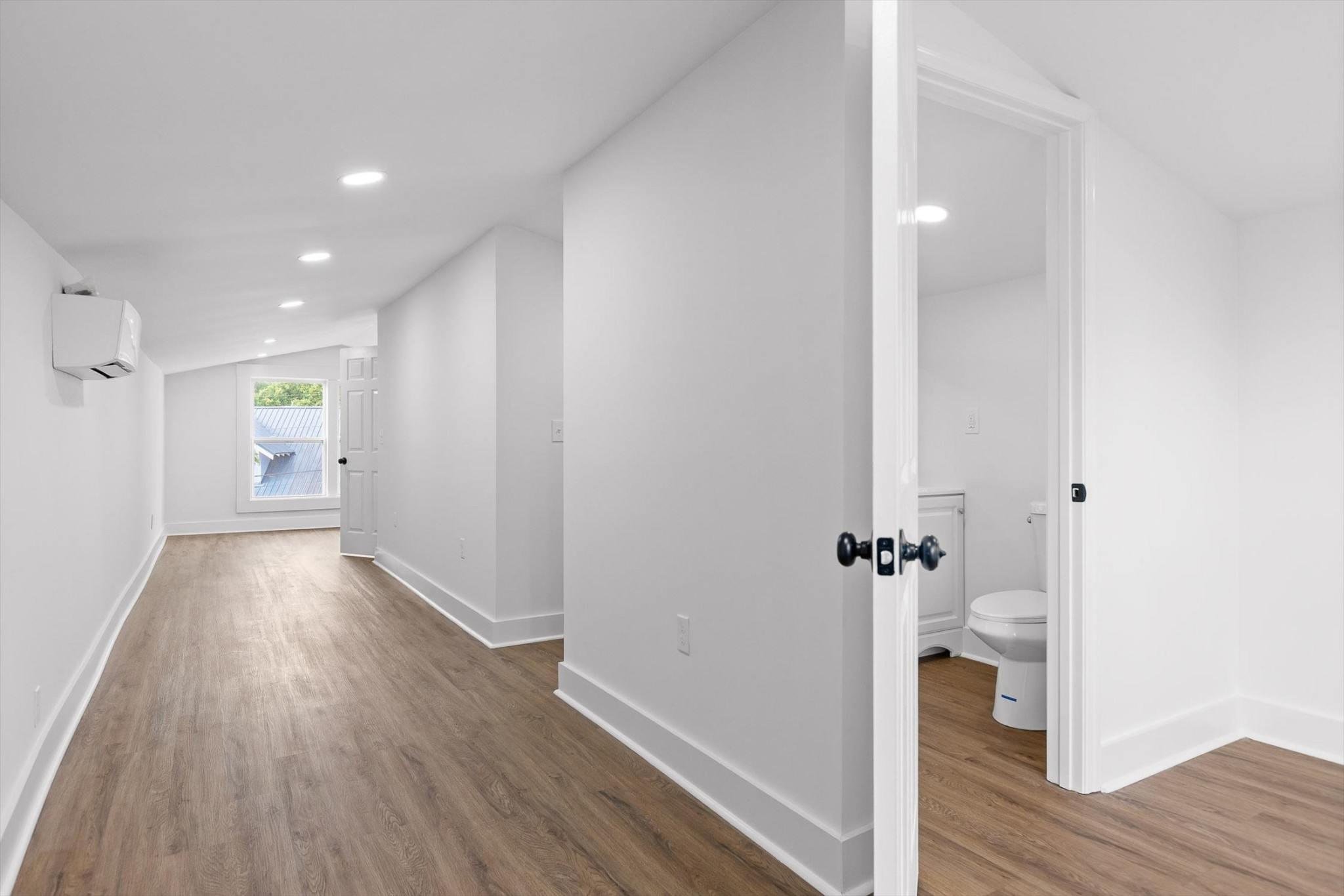 2917 East Crescent Circle Chattanooga, TN 37407 - Photo 4 of 45 a view of a hallway with wooden floor