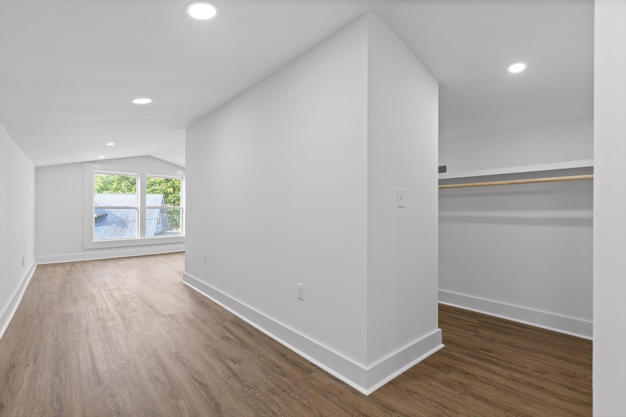 2917 East Crescent Circle Chattanooga, TN 37407 - Photo 7 of 45 a view of an empty room with wooden floor and a window