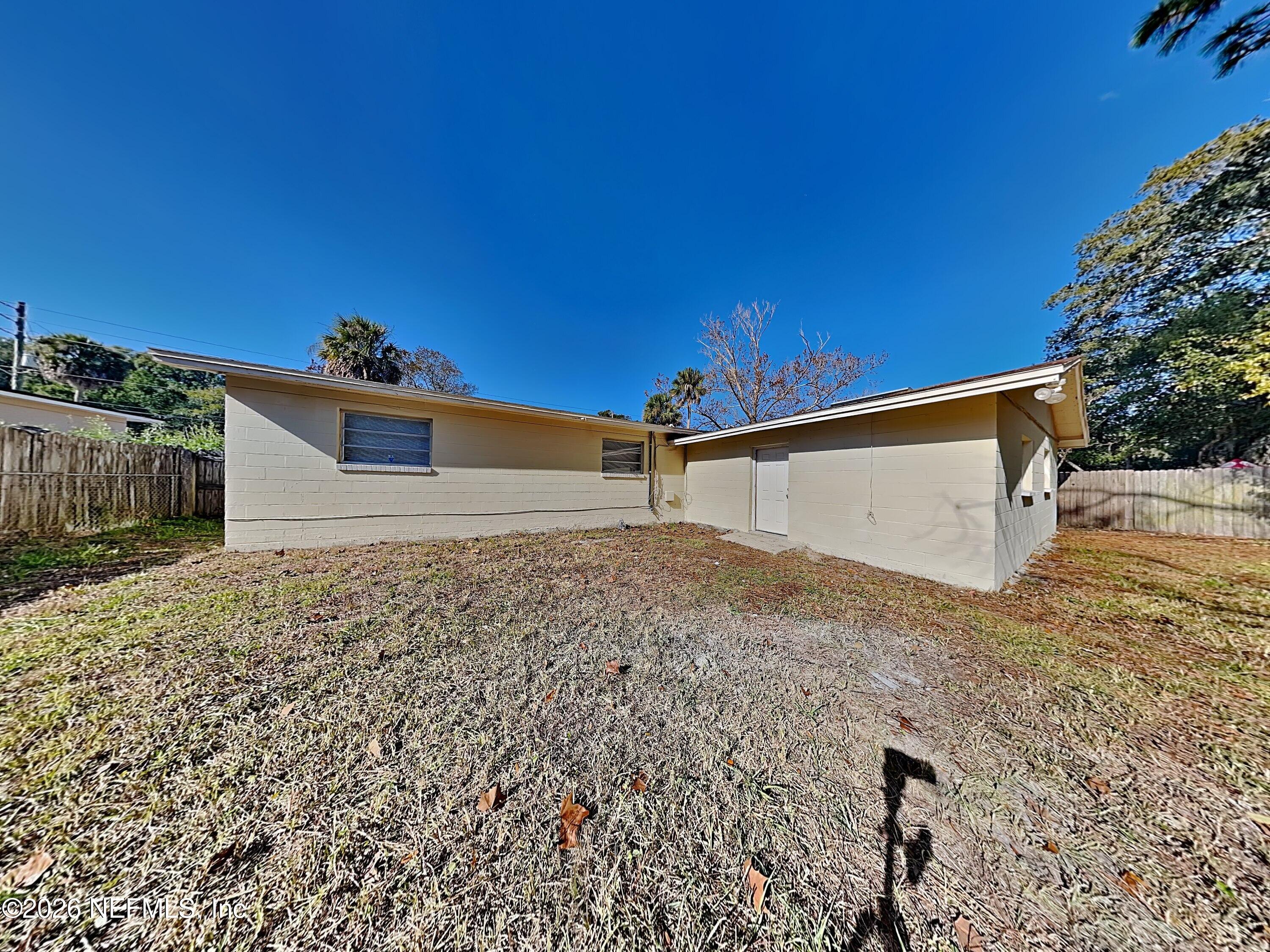 3403 Rogero Road Jacksonville, FL 32277 - Photo 19 of 19 a view of a backyard