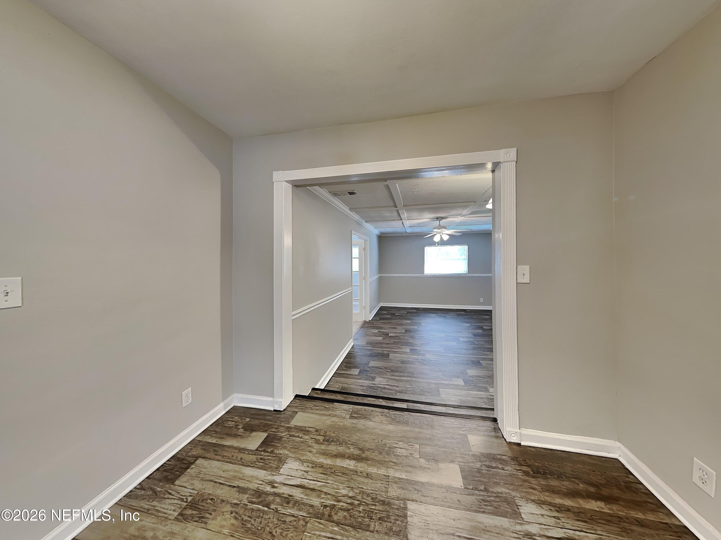 3403 Rogero Road Jacksonville, FL 32277 - Photo 9 of 19 wooden floor in a room