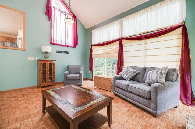a view of a kitchen counter top space and wooden floor