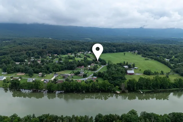 an aerial view of a house with a garden