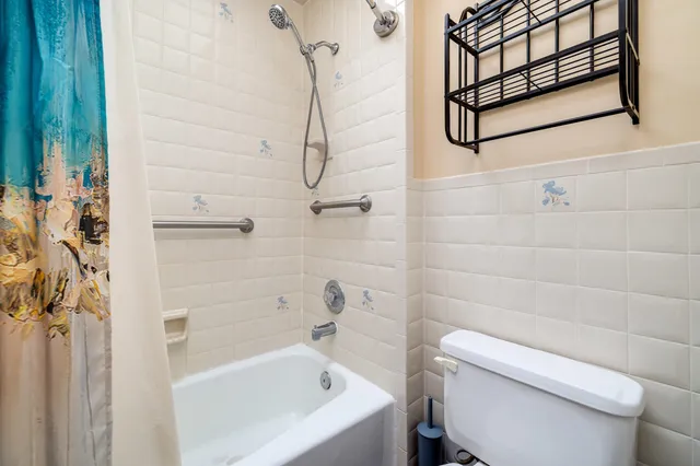 a view of a house with backyard porch and sitting area