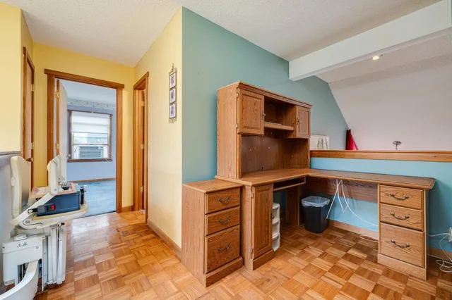 an aerial view of a house with a garden