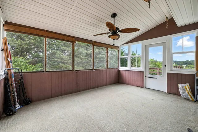 an aerial view of a houses with outdoor space and street view
